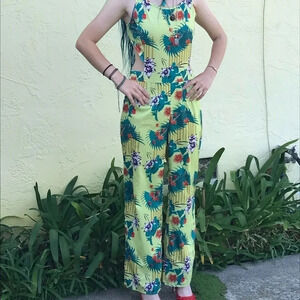 𝅺TROPICAL print jumpsuit cut out sides ties in back sexy slinky NEW size S